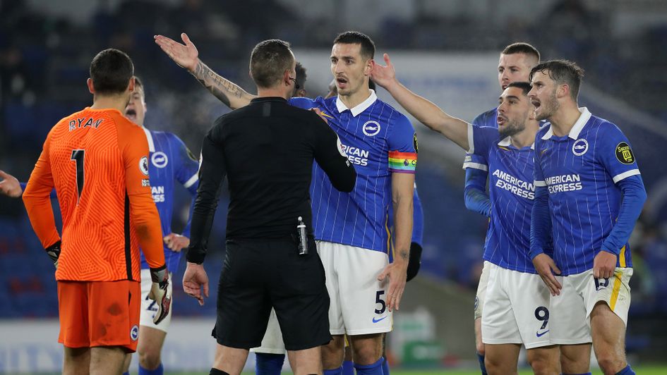 Brighton argue about a penalty decision
