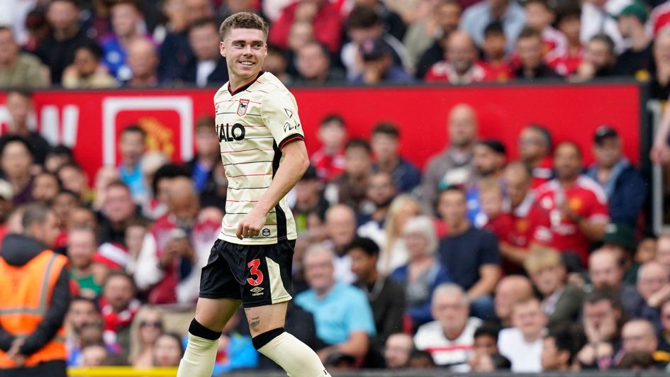 Leif Davis celebrates scoring against Manchester United