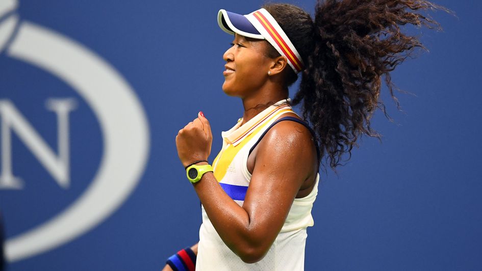 Naomi Osaka celebrates her win