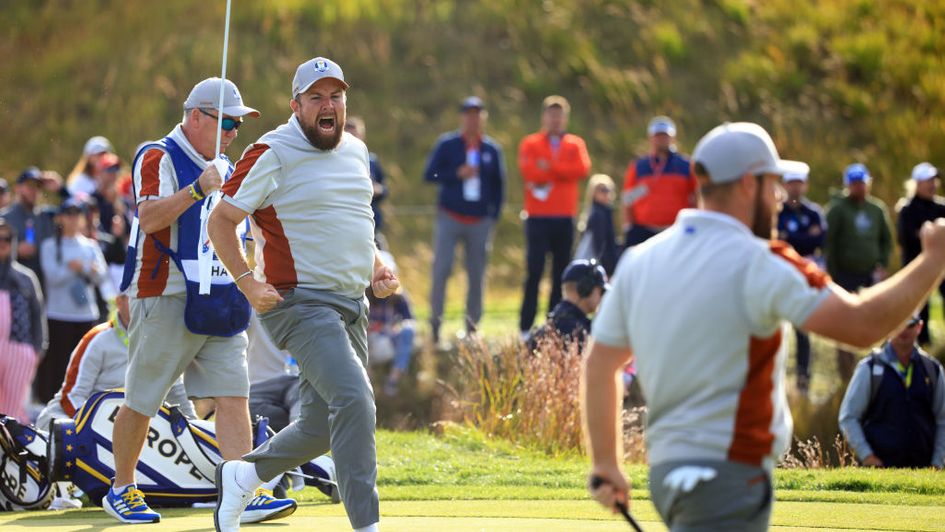 Shane Lowry celebrates as Europe claim a precious point
