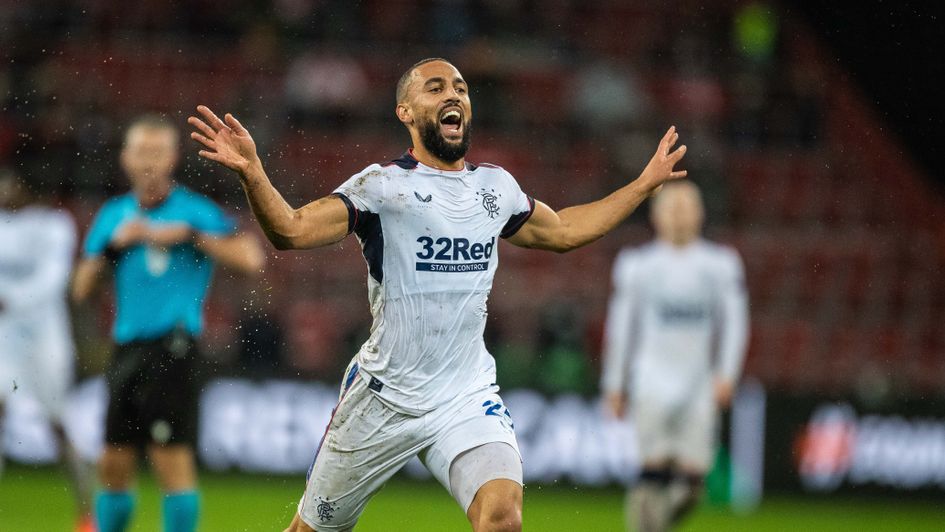 Kemar Roofe celebrates after scoring from the halfway line