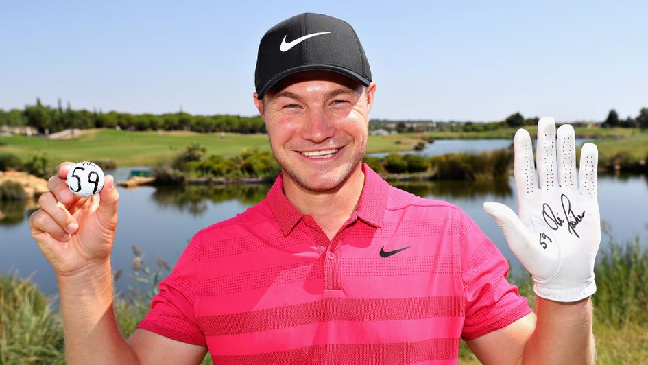 Oli Fisher celebrates after carding a round of 59
