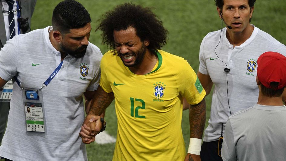 Brazil's Marcelo goes off injured against Serbia