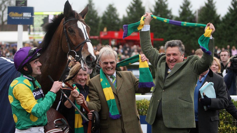 Paul Nicholls leads the celebrations after Kauto Star's fifth win in 2011