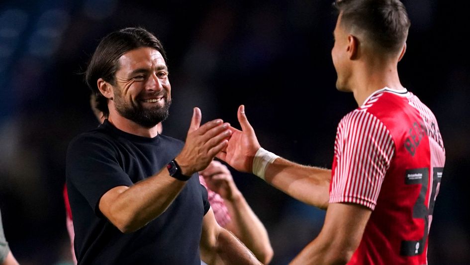 Southampton boss Russell Martin celebrates with Jan Bednarek after victory at Sheffield Wednesday