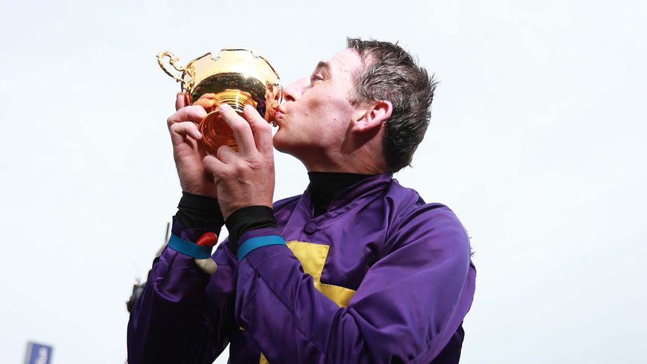 Davy Russell kisses the Cheltenham Gold Cup