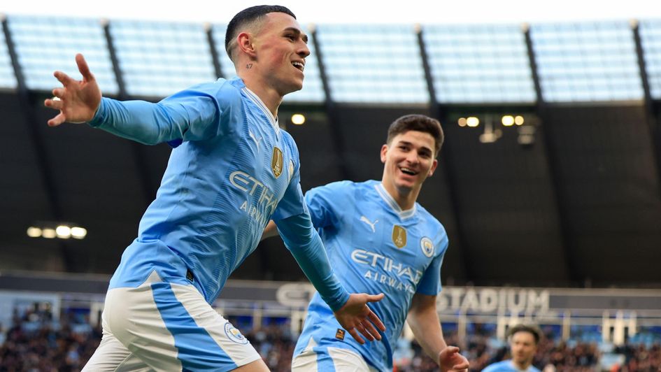 Phil Foden: Man City forward celebrates one of two goals against Huddersfield