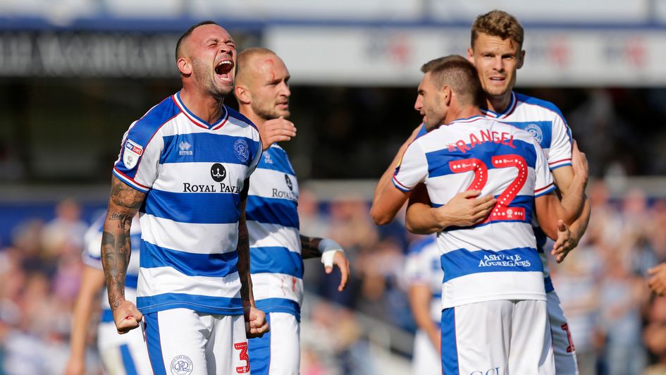 Joel Lynch and his QPR team-mates celebrate QPR's first win in the Sky Bet Championship