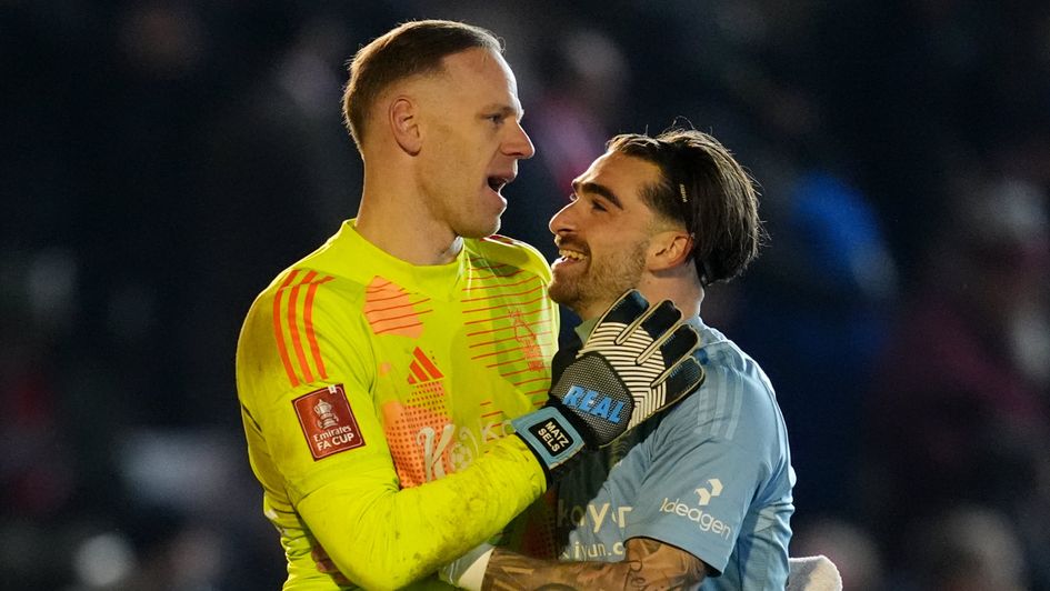 Nottingham Forest goalkeeper Matz Sels (left) and Jota Silva (right) embrace after winning the penalty shoot out during the Emirates FA Cup fourth round match at St James Park, Exeter.