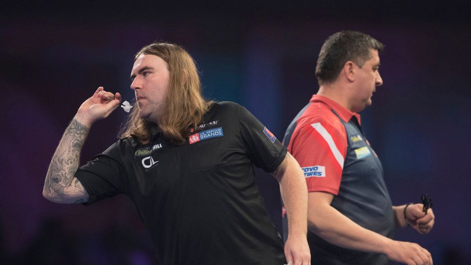 Ryan Searle defeated Mensur Suljovic (Picture: Lawrence Lustig)
