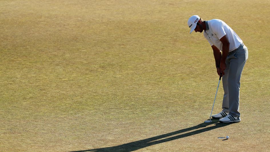 Dustin Johnson misses a putt for a play-off at Chambers Bay