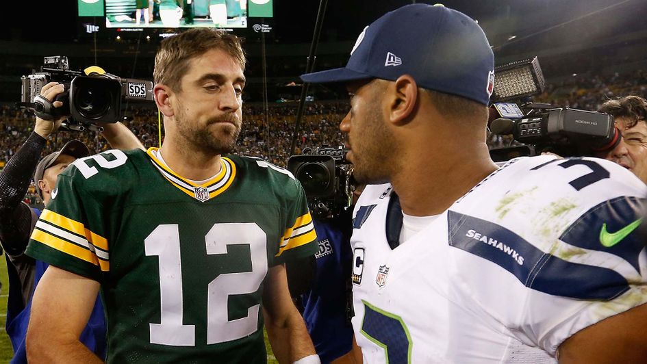 Green Bay Packers QB Aaron Rodgers goes up against Seattle Seahawks opponent Russell Wilson