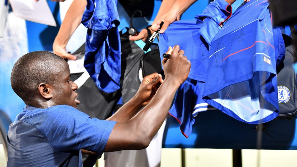 N'Golo Kante: French midfielder signing Chelsea shirts for fans in Japan