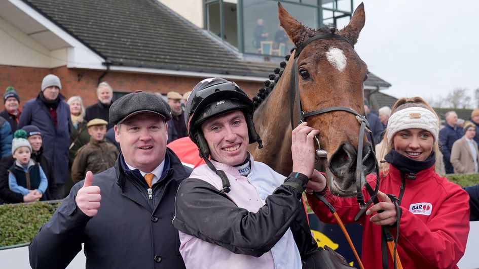 Jack Kennedy stands with Teahupoo and trainer Gordon Elliott