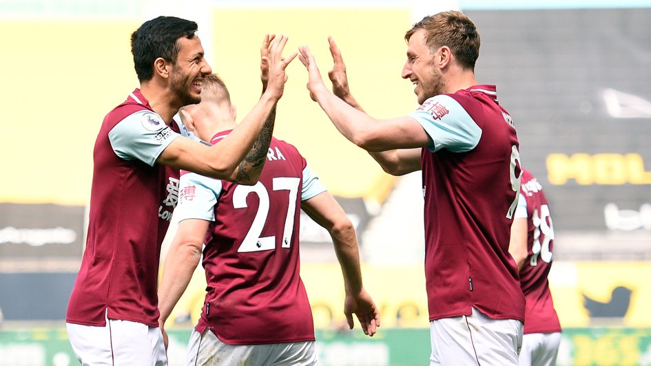 Chris Wood (right) scored his first hat-trick for Burnley