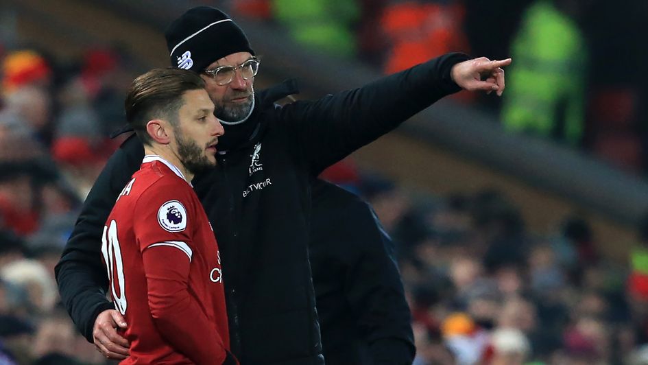 Jurgen Klopp (right) gives instructions to Adam Lallana