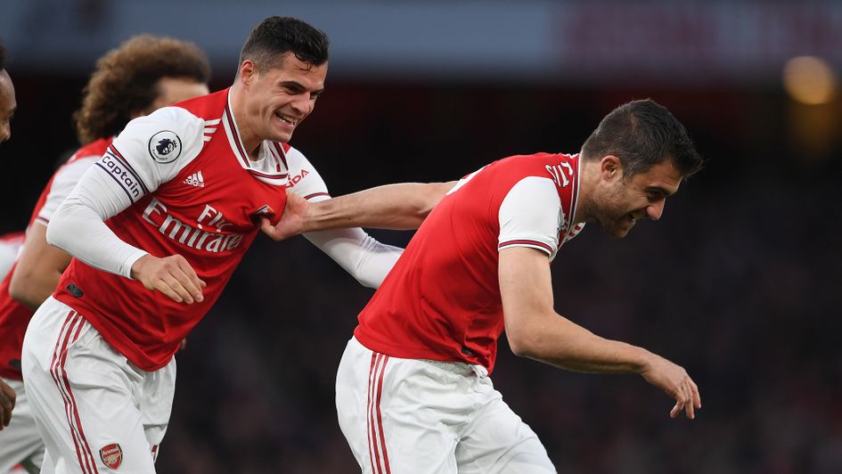 Sokratis celebrates his goal against Crystal Palace with Granit Xhaka