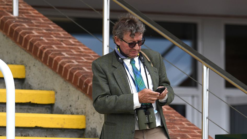 Mark Johnston on his way to the winners enclosure at Goodwood