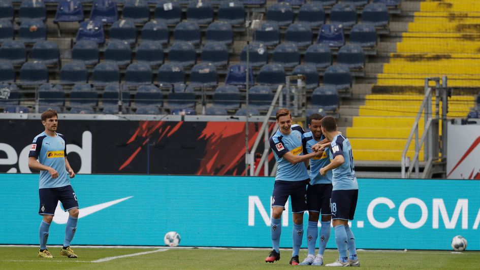 Borussia Monchengladbach celebrate Alassane Plea's goal against Eintracht Frankfurt, which came after 37 seconds