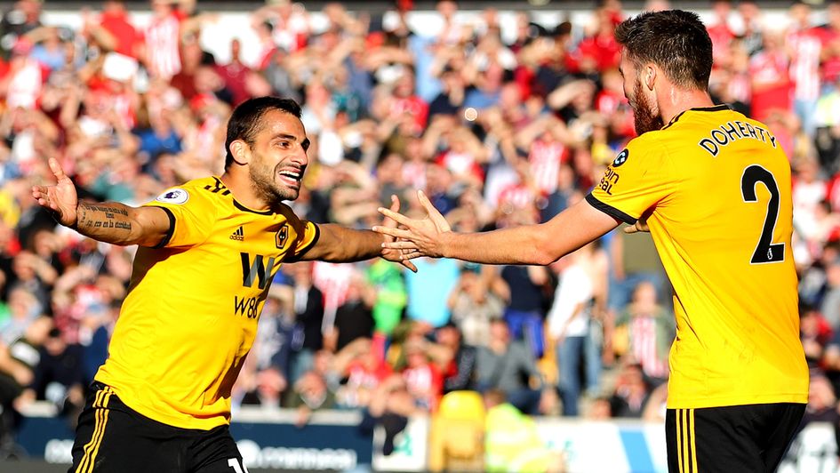 Jonny (left) celebrates his goal for Wolves against Southampton