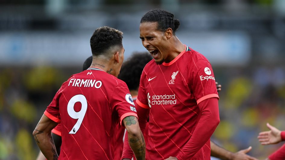 Firmino and Van Dyke celebrate