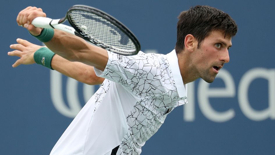 Novak Djokovic returns a shot