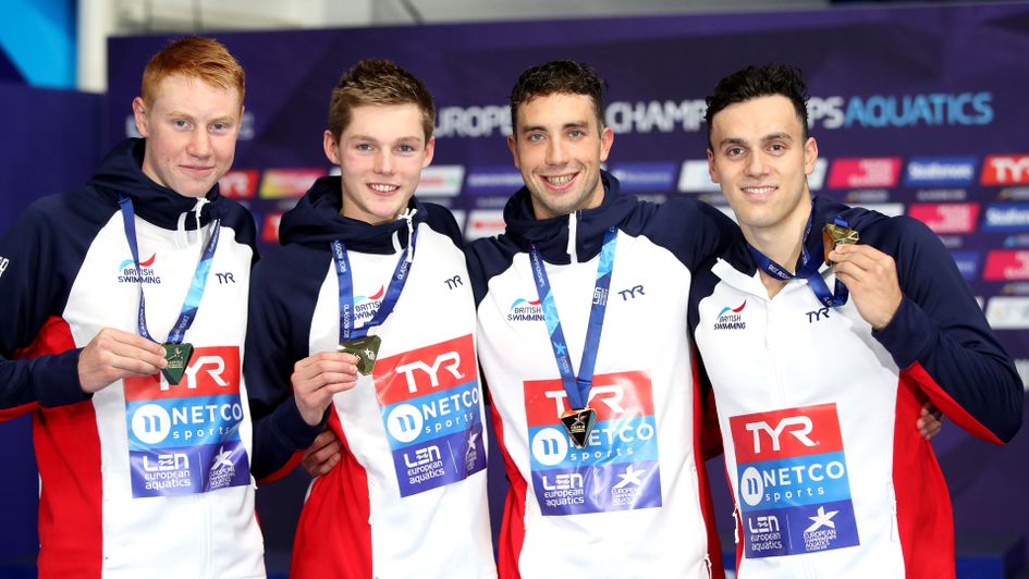 Calum Jarvis, Duncan Scott, Thomas Dean and James Guy celebrate gold in the nen's 4x200m freestyle relay