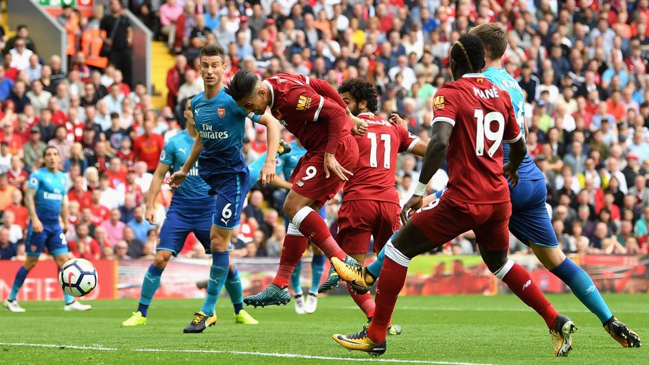 Roberto Firmino scores for Liverpool against Arsenal