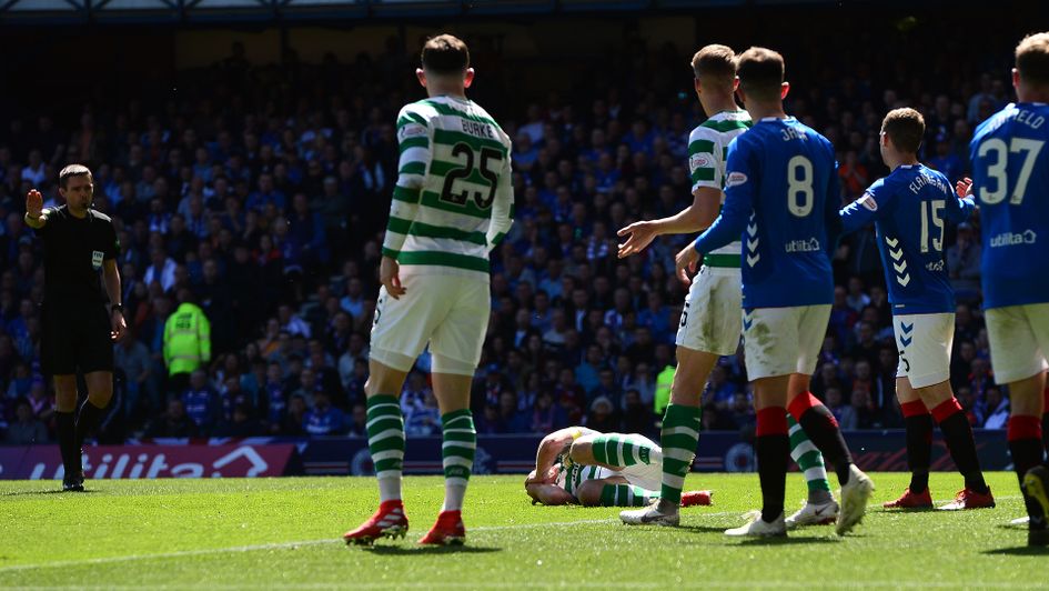 Scott Brown goes down after a clash with Jon Flanagan