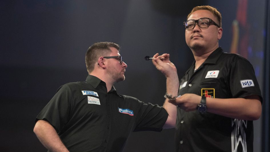 James Wade in action against Seigo Asada (Picture: Lawrence Lustig)