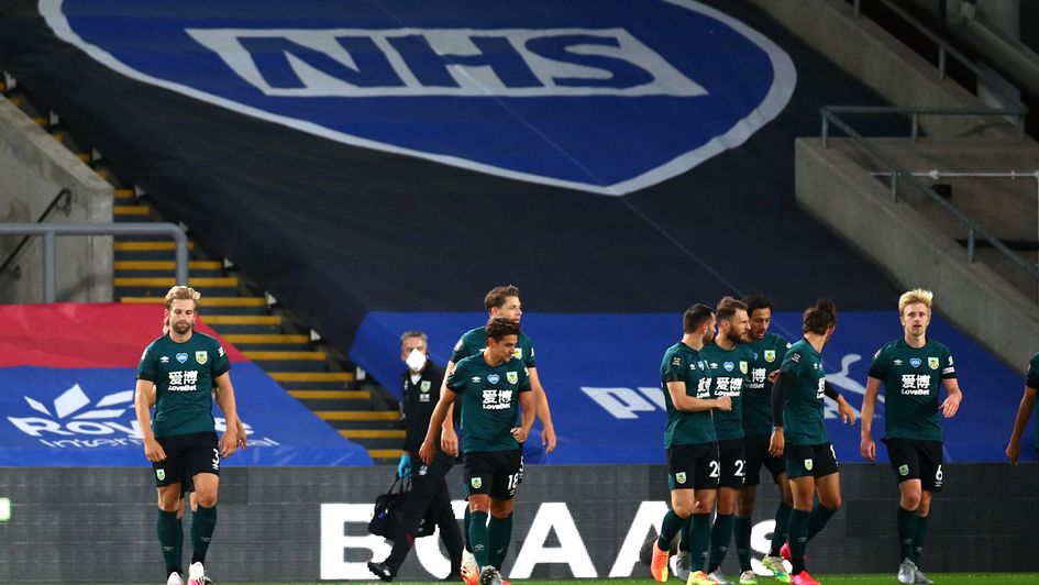 Ben Mee (right) celebrates after scoring at Crystal Palace