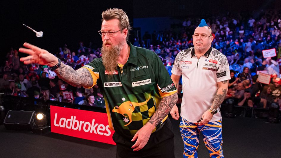 Simon Whitlock and Peter Wright (Picture: Taka Wu/PDC)