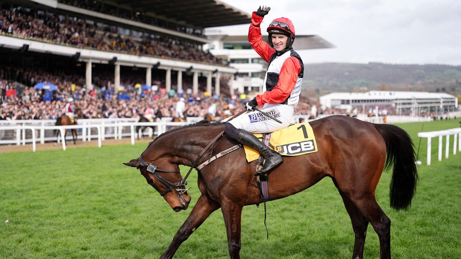 Patrick Mullins celebrates after winning the JCB Triumph Hurdle aboard Apolon De Charnie