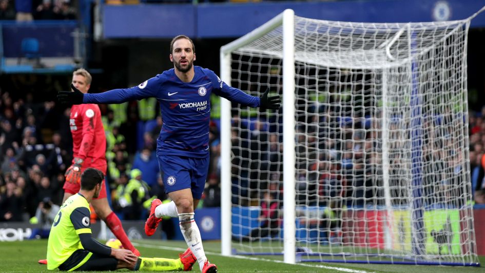 Gonzalo Higuain celebrates after scoring against Huddersfield