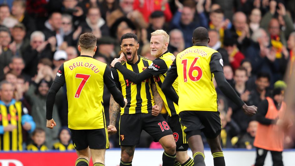 Andre Gray is congratulated by teammates after scoring the equaliser against Wolves
