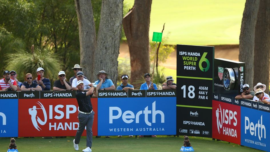 Lee Westwood tees off at the 18th hole
