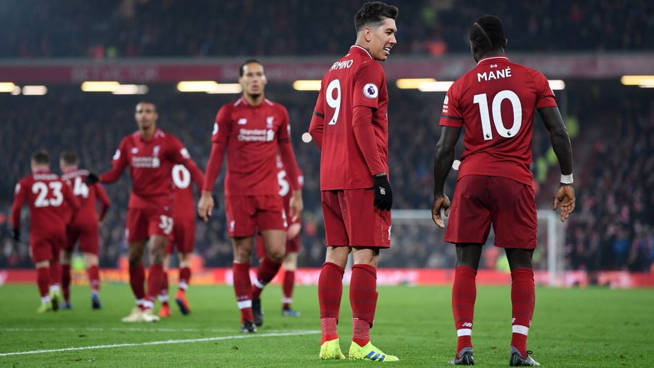 Celebrations for Liverpool's Sadio Mane (right) and Roberto Firmino (second, right)
