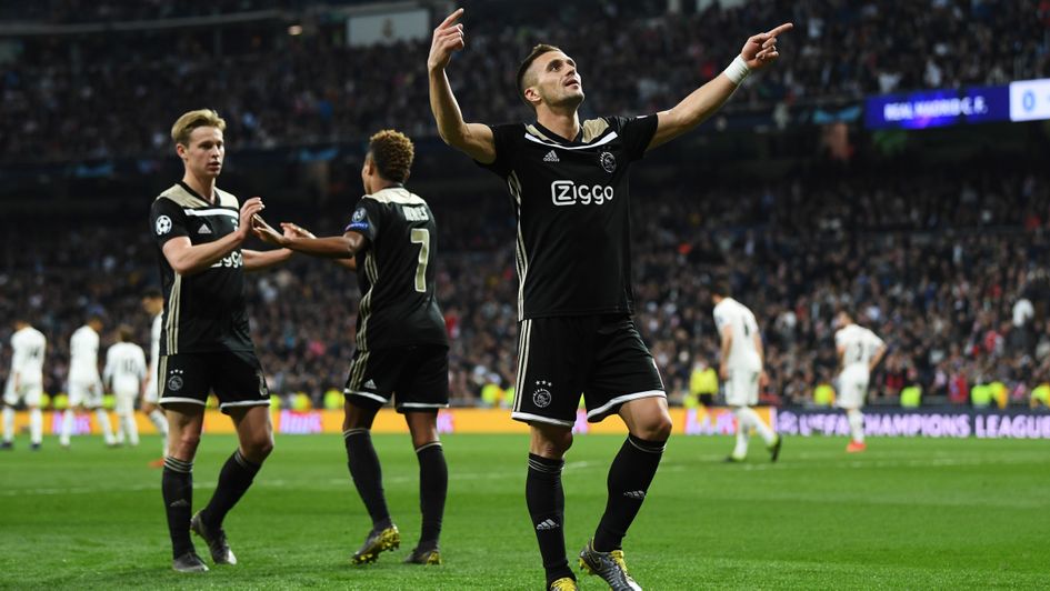 Dusan Tadic: The Ajax forward celebrates at the Bernabeu