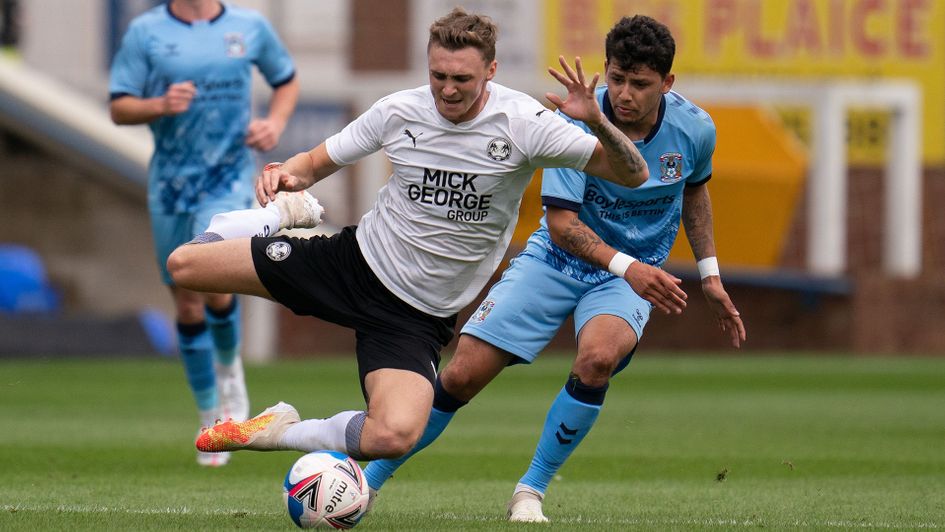 Gustavo Hamer fouls Peterborough's Jack Taylor