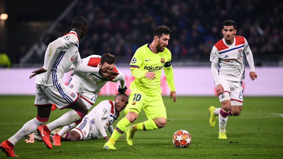 Lionel Messi finds his way through the Lyon defence
