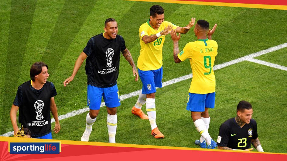 Firmino and Gabriel Jesus celebrate Brazil's second goal against Mexico