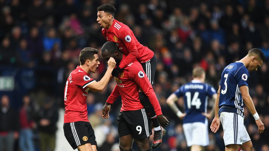 Manchester United celebrate scoring against West Brom