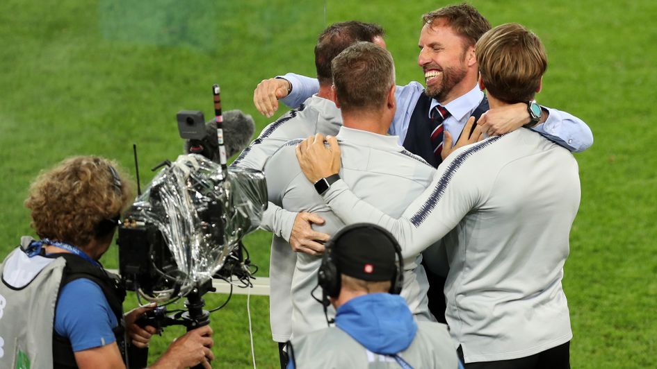 Gareth Southgate celebrates with his coaching staff