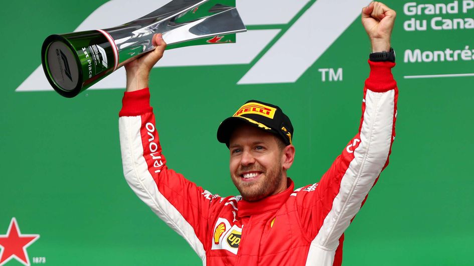 Sebastian Vettel celebrates winning the Candian Grand Prix