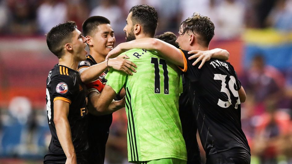 Wolves celebrate with Rui Patricio after beating Man City on penalties in the Premier League Asia Cup