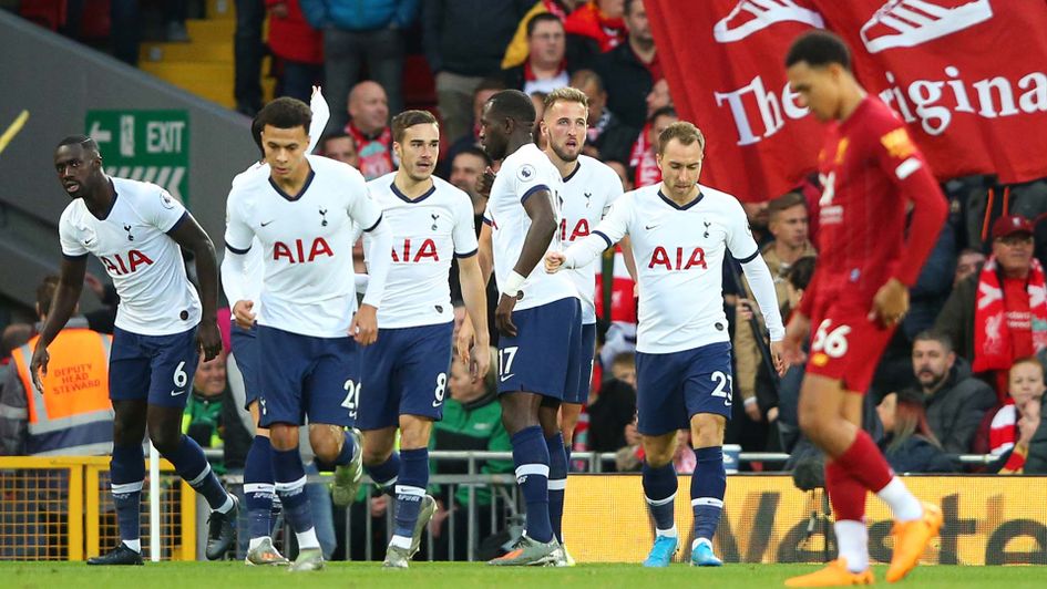 Tottenham celebrate scoring against Liverpool at Anfield