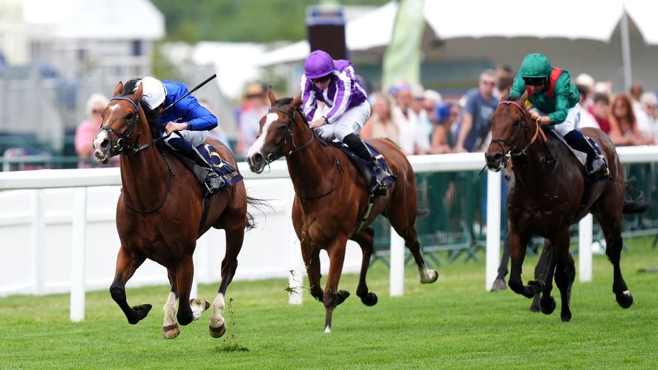 William Buick and Ombudsman pull clear of Minnie Hauk at Royal Ascot