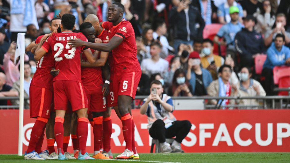 Liverpool celebrate a goal against Manchester City