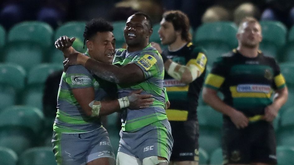 Sonatane Takulua (l) celebrates with Vereniki Goneva after winning the game for Newcastle