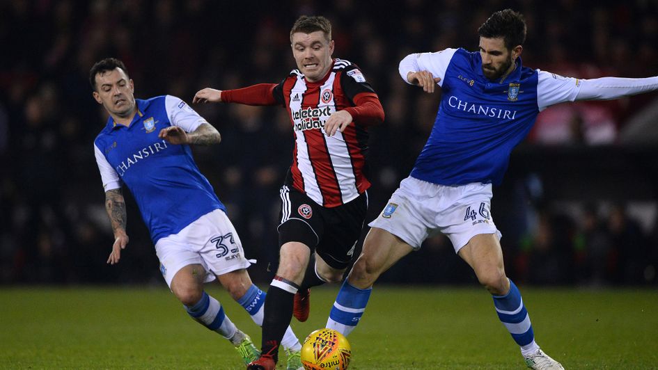 United and Wednesday battle for the ball